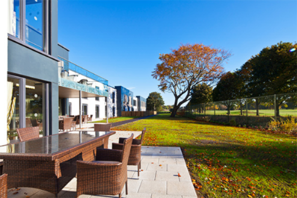 Outside patio at a care home. Elevation is a specialist investment manager in the European senior living and healthcare real estate sector.