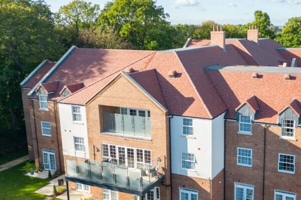 Care home from elevated perspective. As healthcare real estate investors, we provide long-term strategic investment in care home real estate, helping to provide suitable housing to this growing and resilient market.